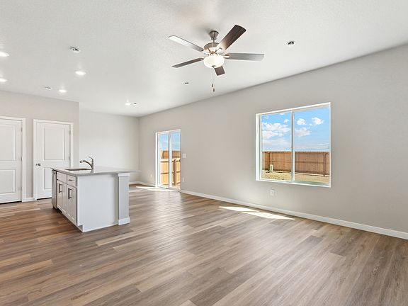 The family room is spacious and open to the dining room and kitchen.