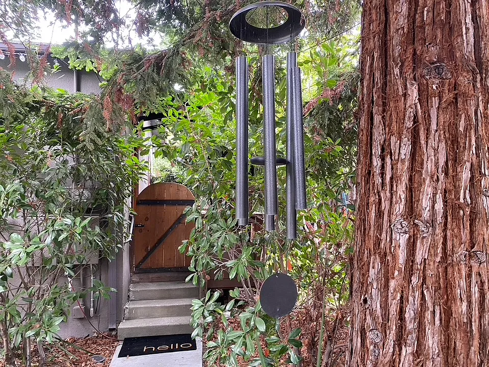 Three steps up to the cottage deck and front door