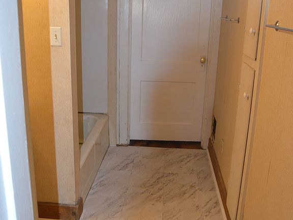 New flooring in bath. Both bedrooms have direct access to bathroom.