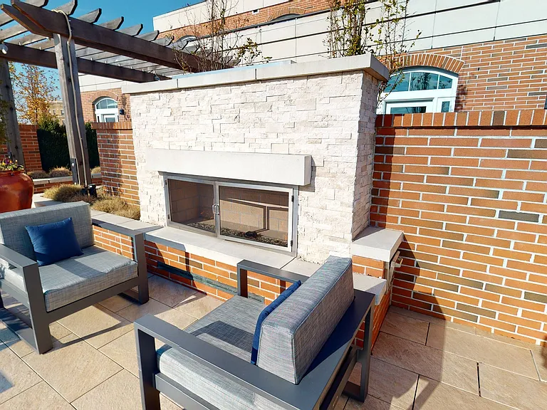 Outdoor fireplace on the rooftop terrace