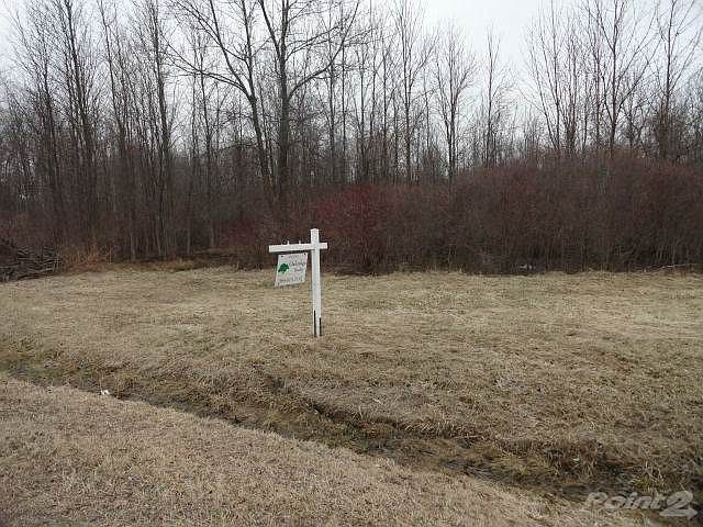 Sign is just about middle of frontage.