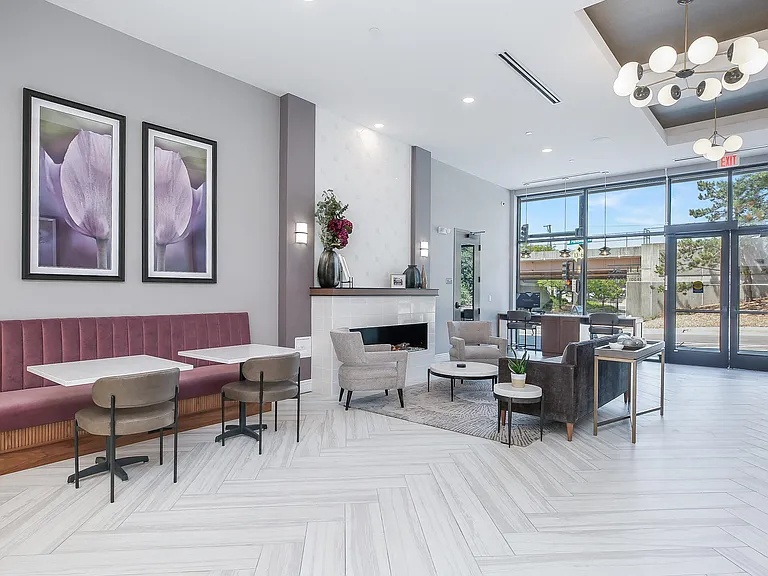 Hotel Style lobby with complimentary coffee bar, fireplace, seating and computer/printer