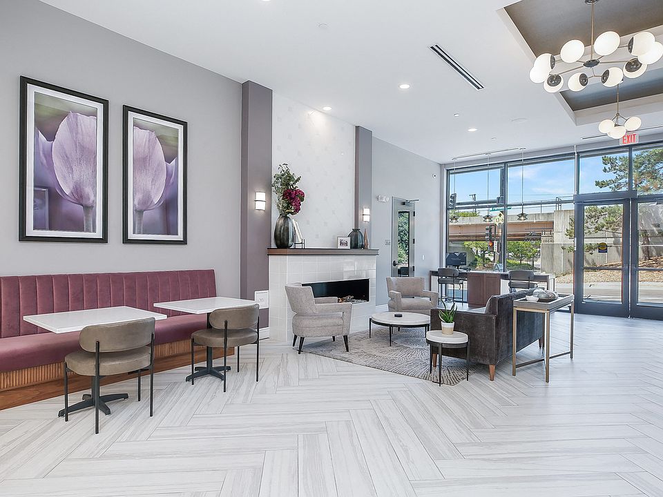 Hotel Style lobby with complimentary coffee bar, fireplace, seating and computer/printer