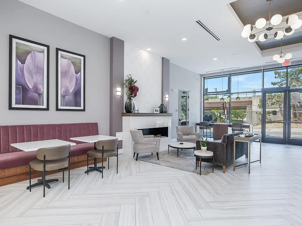 Hotel Style lobby with complimentary coffee bar, fireplace, seating and computer/printer