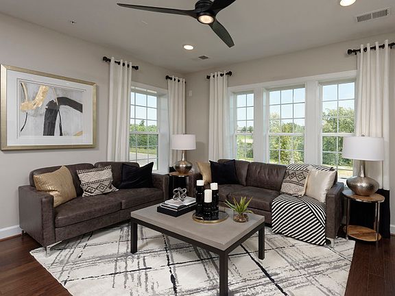 Model Representation - Great Room with Hardwood Floors and is Open to the Kitchen and Dining Space