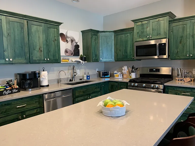A convenient quartz topped breakfast bar with seating for three.