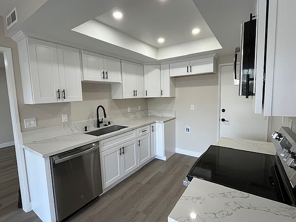 Fully remodeled kitchen with shaker style cabinetry.