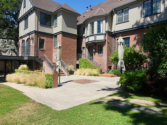 back patio and balcony off the family room/kitchen
