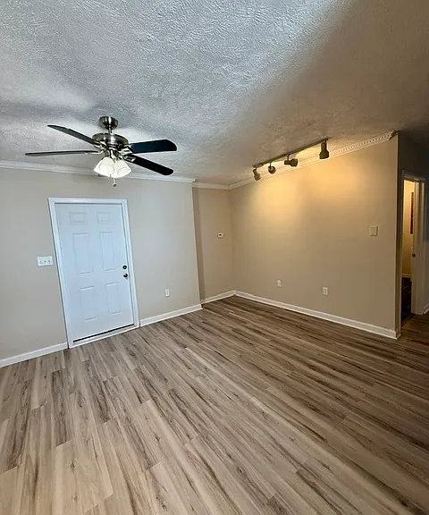 View to front door, living room area