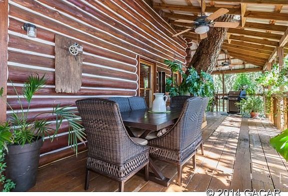 Porch encircles the home