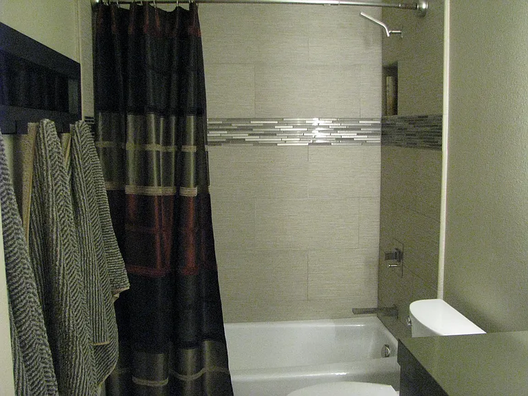 Hall bath with tub/shower.