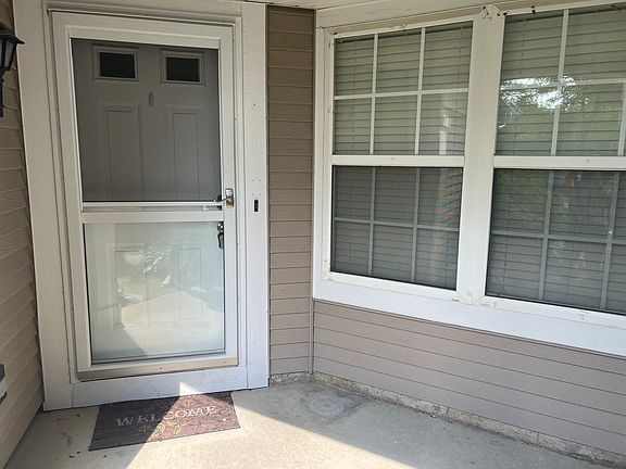Front door with large breakfast area window