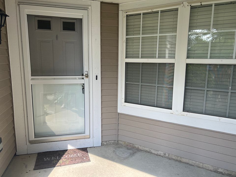 Front door with large breakfast area window