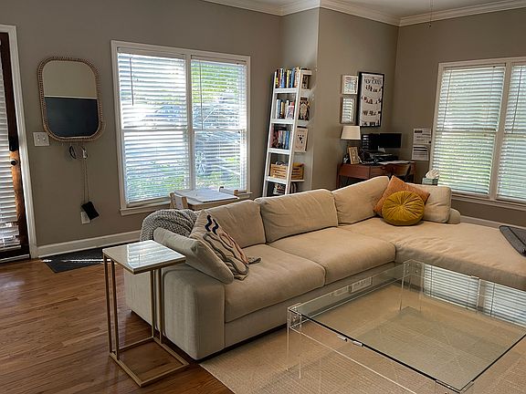 Enter the home to open concept living room (to the left).
