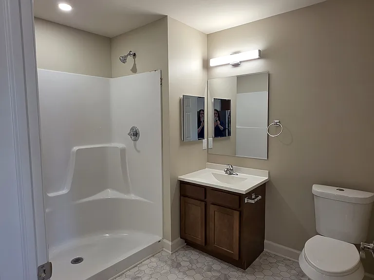 Common bath with accessible features - large space and walk in shower.