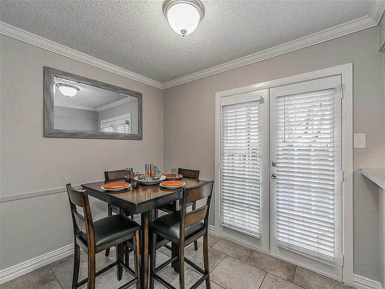 Thoughtfully designed dining space with easy kitchen access.