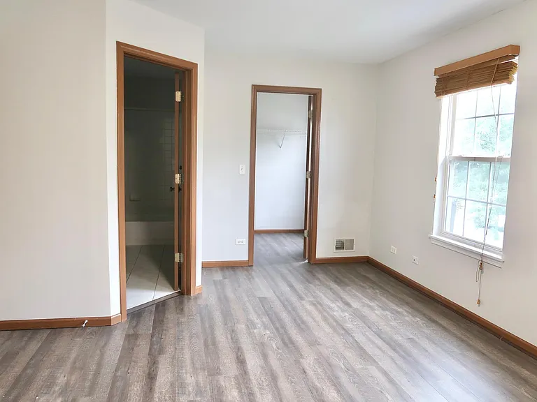 Master bedroom with walk-in closet.