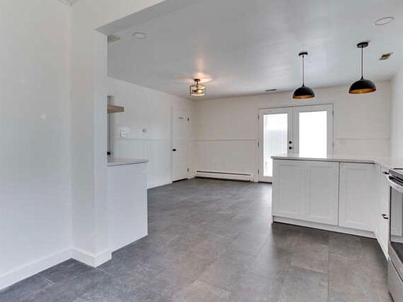 kitchen with laundry area and huge pantry and coat closet master