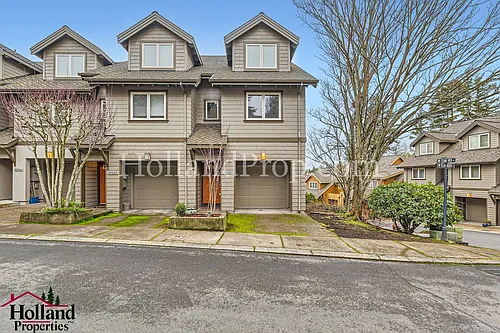 10250 NW Village Heights Dr Photo 1