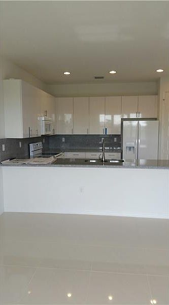1st image of 632 NE 191st St