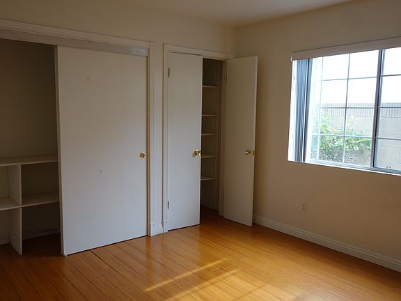 Bedroom 1 with built in shelves