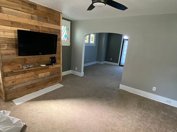 Living room looking into dining room.