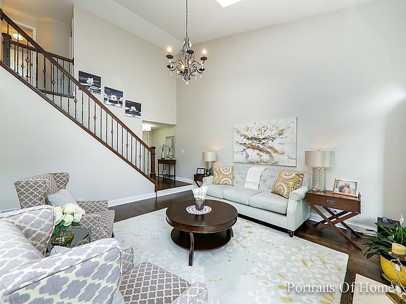 Alternate view of the living room. The staircase was replaced in 2015. Beyond the staircase is the f