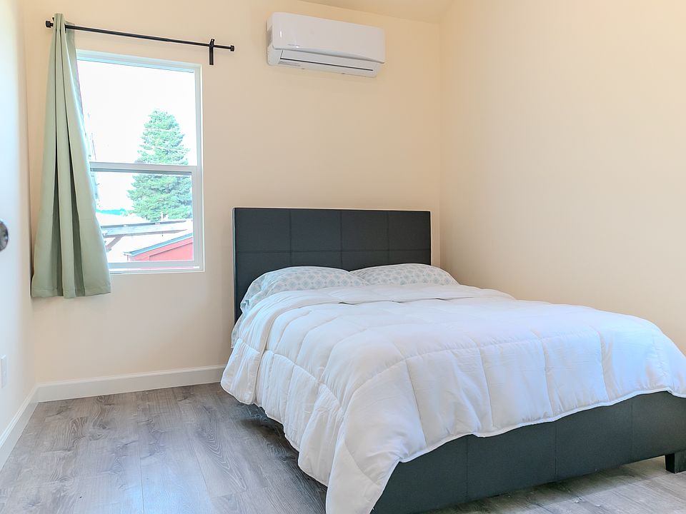 Vaulted ceilings, heating and air, large closets, and two large windows. This bed is super conformable if you need furnished.