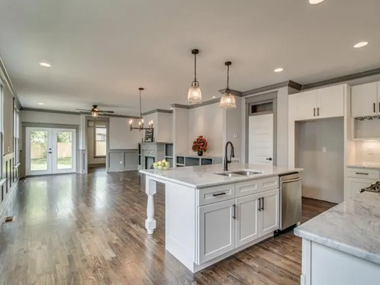 Open floor plan with office in room facing backyard, plantation shutters on all windows!