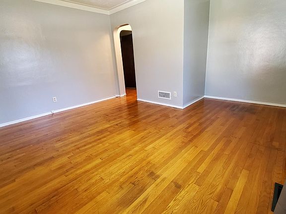 looking towards hallway, shows the shape of the room.