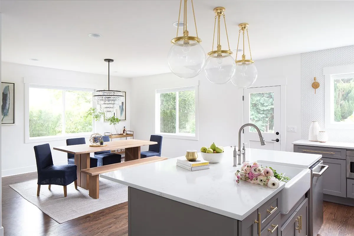 Dining room offset of kitchen island creates large entertaining space and flow - 4133 46th Ave SW