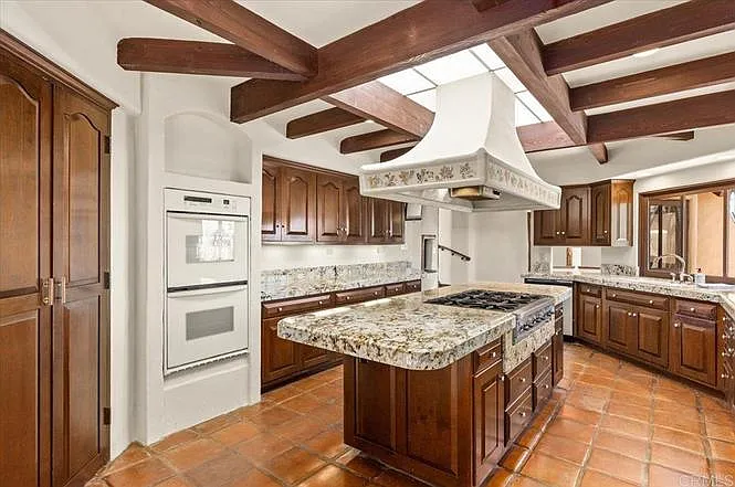 Kitchen has double ovens and walk-in pantry