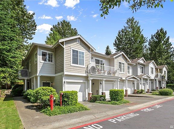 Oversized attached one car garage is third from right. The covered entry is on the left.