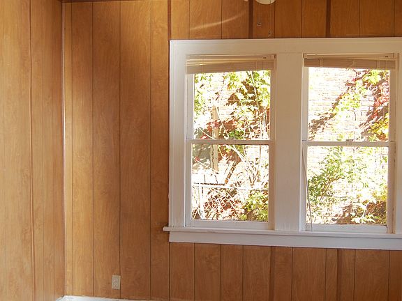 Front bedroom with ceiling fan.