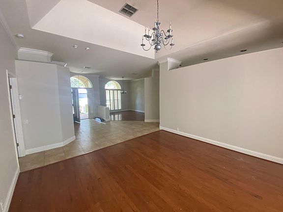 Front door and formal dining room at front