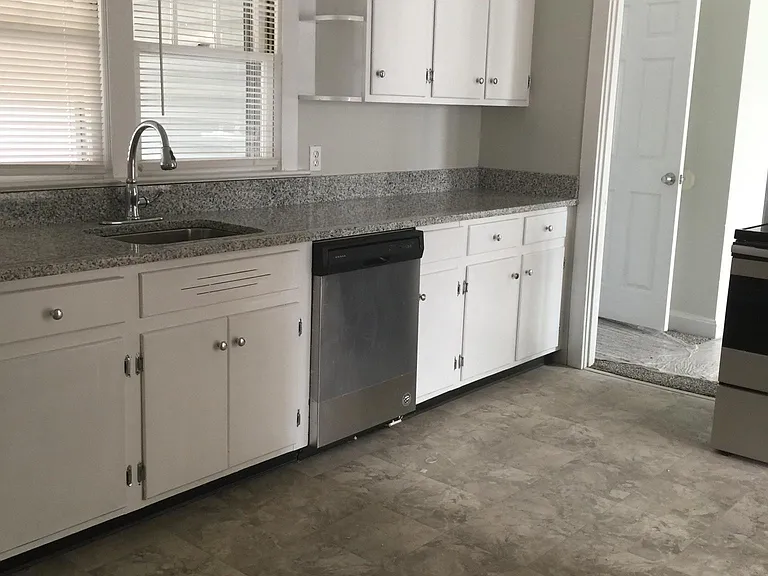 Eat-in Kitchen. Tenant provides refrigerator
