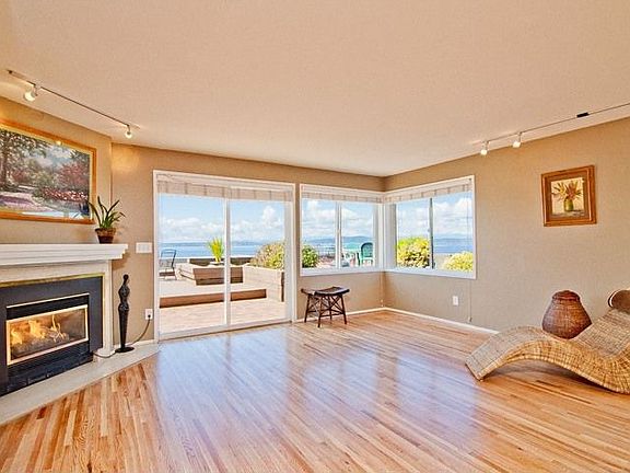 Gorgeous interiors with gleaming (just refinished) hardwood floors & gas fireplace. Lots of room here to make it your own.