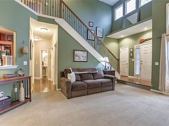 Attractive iron staircase leads to an oversized loft, 2 great sized bedrooms and a large full bath.