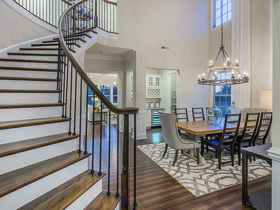 Grand Staircase and Formal Dining Room