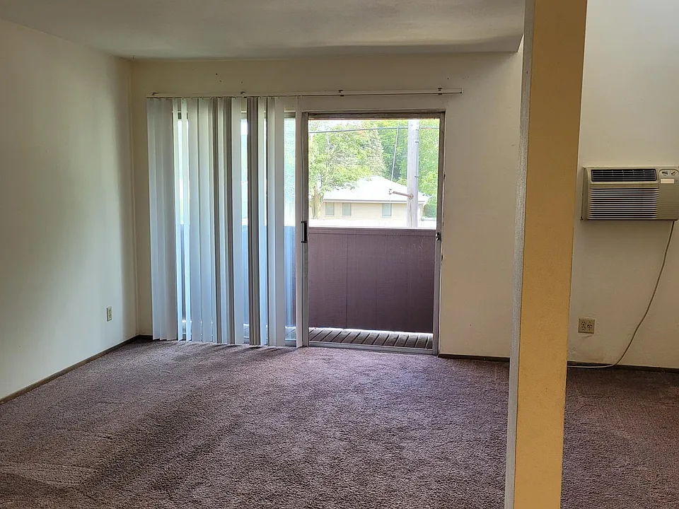 Carpeting has been removed. Replaced with wood plank flooring.