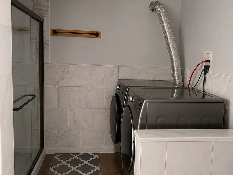 Primary En Suite Bathroom with Laundry