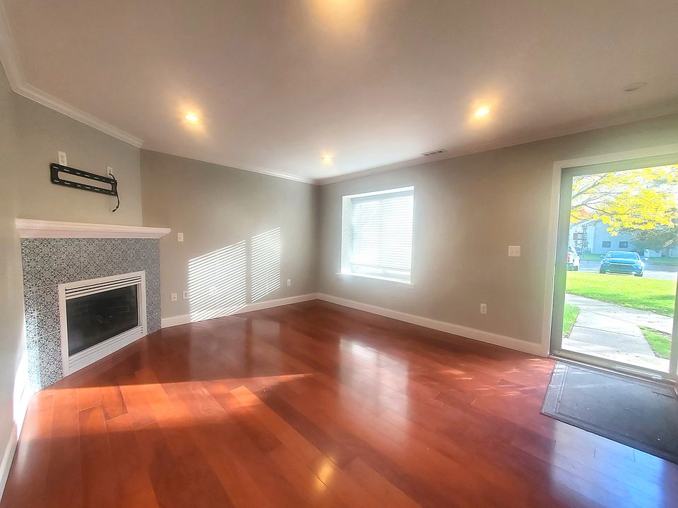 Spacious living room with fireplace