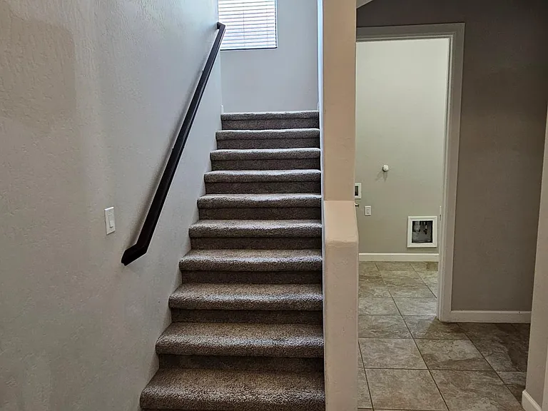 Foyer leading stairs