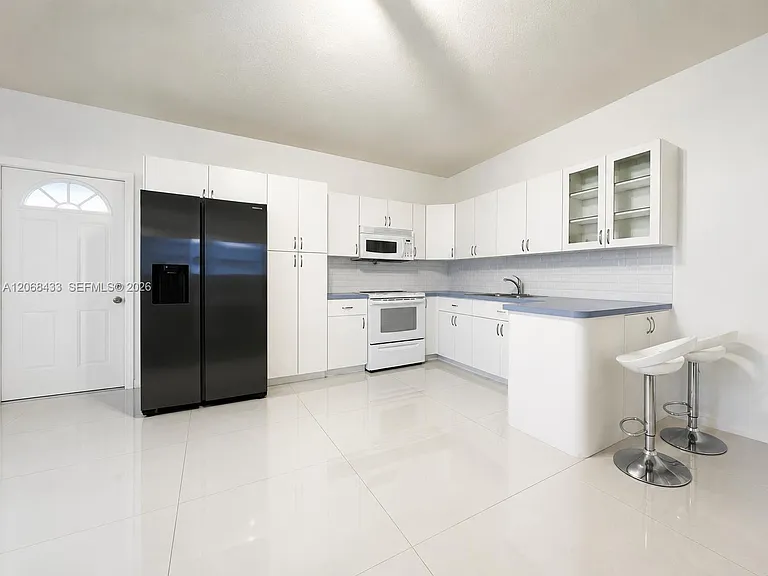 14180 SW 8th Ter #1 — Photo 4