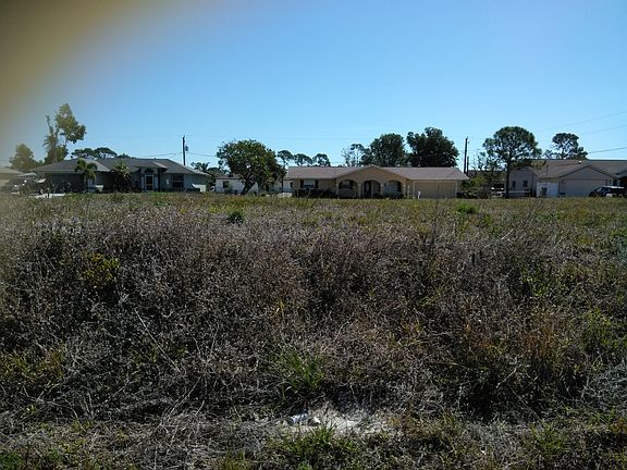 Across back west side of lot