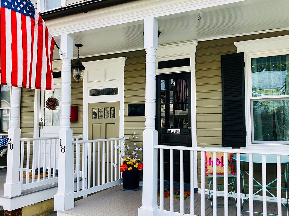Welcome home! New front porch, new painting, new windows.