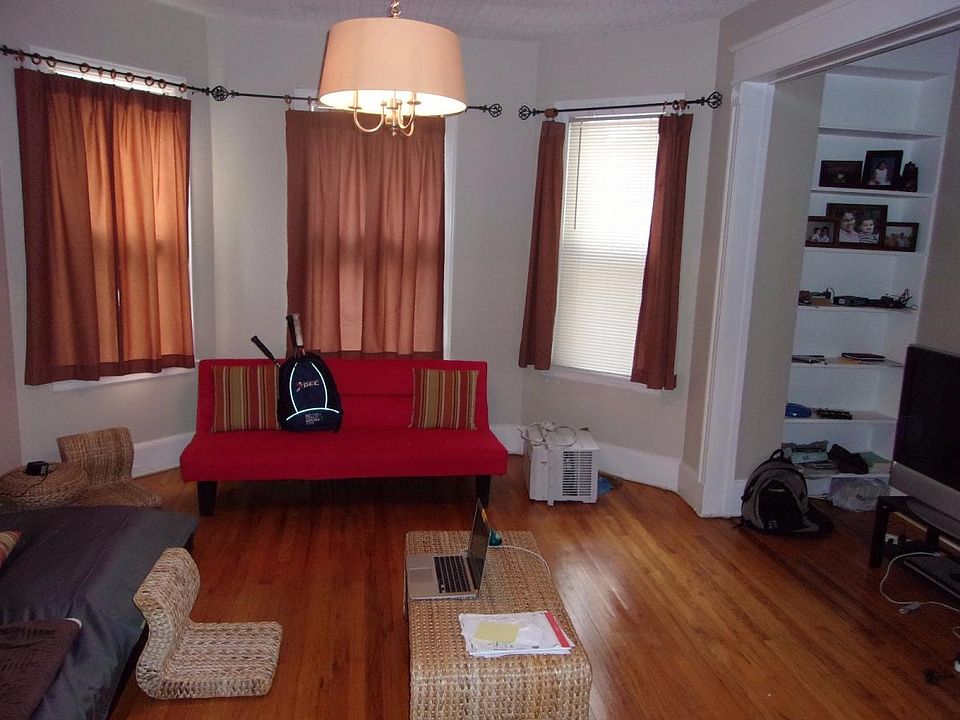 Living room with bay windows and alcove