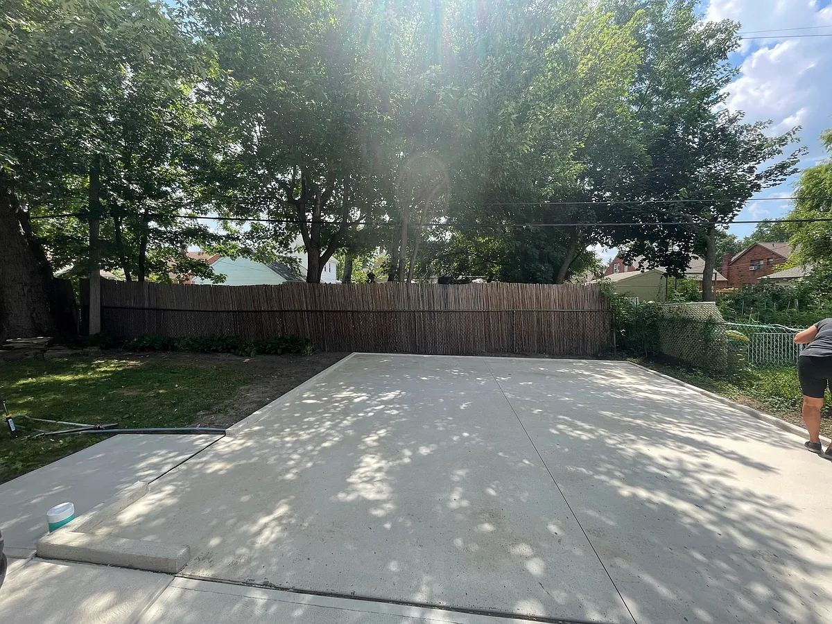 NEW Backyard parking pad, driveway. - 17015 Valleyview Ave