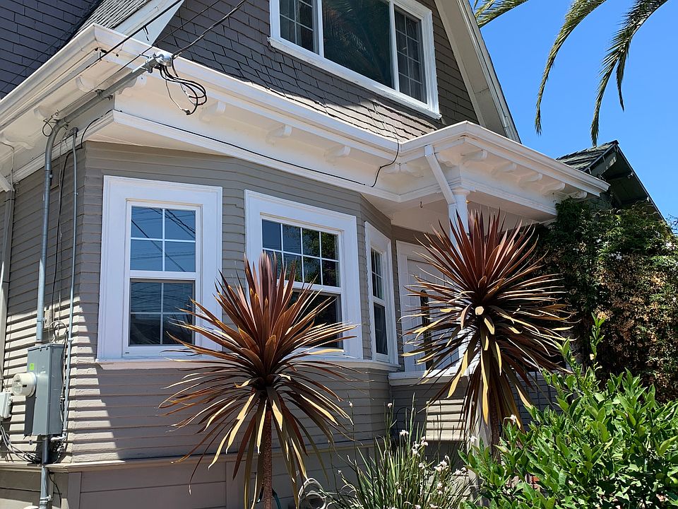 Front of house, with gated entry and gated driveway