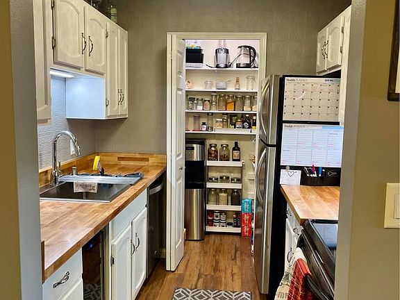 walk-in pantry with plenty of storage space